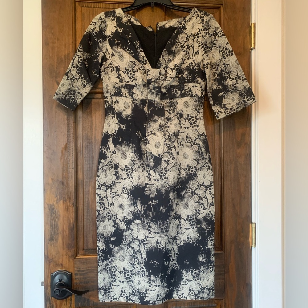 Brand: Alexander McQueen
Category: Dress. Colors: Black and Gold flowers